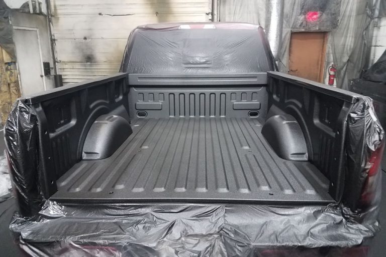 Spray in bedliner applied and is ready to be unmasked.